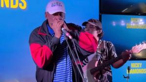 Jimmie Rose on blues harmonica with Slim Jim and the Flinchers